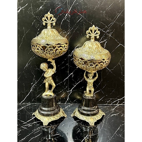 خرید آنلاین، شکلات خوری برنزی در دار، طرح پسر بچه پایه سنگ شکیل و طلایی، به قیمت مناسب | هنرظریف