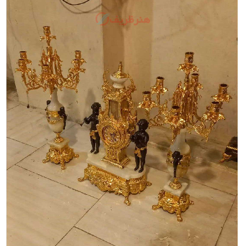 خرید، قیمت و مشخصات ساعت و شمعدان خروسی برنزی مدل عروسک بزرگ با سنگ مرمر اصل و گارانتی رنگ _ هنرظریف