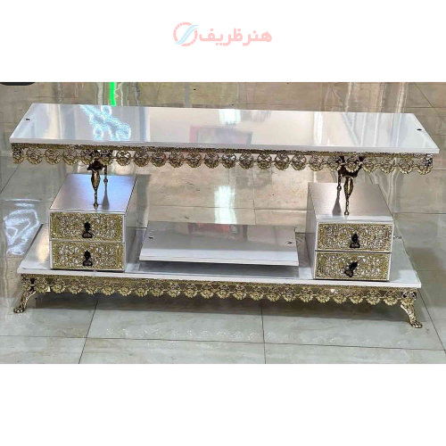 خرید، قیمت و مشخصات  میز تلویزیون برنزی دو طبقه دارای 4 کشو، صفحه ام دی اف سفید ارزان و باکیفیت _ هنرظریف