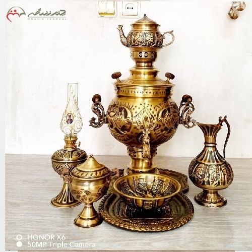 خرید آنلاین، سرویس سماور 7 پارچه ذغالی 6 لیتری توپی شکل، قلم زنی برجسته شیر و دارای ضمانت، با قیمت مناسب | هنرظریف