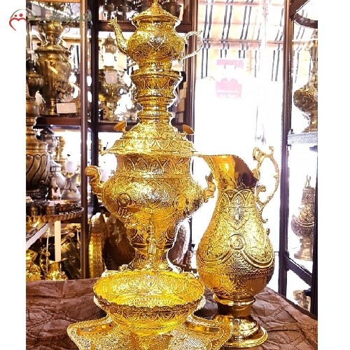 خرید آنلاین، سرویس سماور 5 لیتری ذغالی برنجی کد 116 با  قلم زنی دست و آبکاری طلای 24 عیار، دارای گارانتی، زیر قیمت بازار | هنرظریف