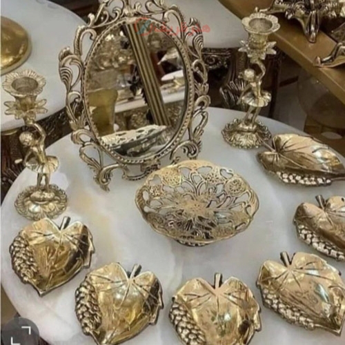 هفت سین برنجی طرح برگ به همراه آینه و شمعدان