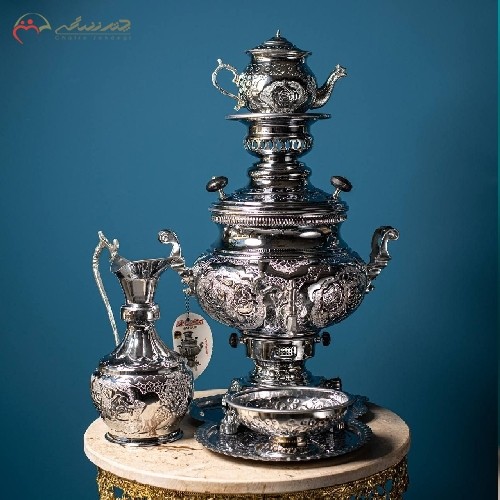 سماور گازی برنجی آبکاری شده با کروم در طرح عدسی گل و مرغ، دارای ضمانت 15 ماهه - هنرظریف