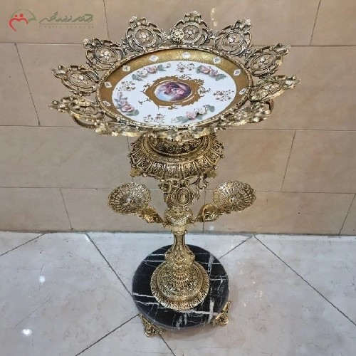 میوه خوری کنار سالنی با بدنه ی تمام برنزی و رنگ طلایی طرح دار، زیبا و با کیفیت - هنرظریف