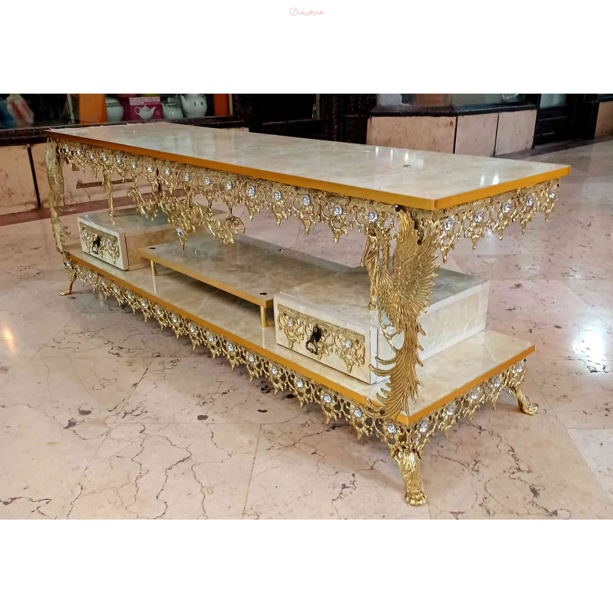 خرید میز تلویزیون طرح طاووس طول 120 جنس آلیاژ آلومینیوم آبکاری برنز| هنرظریف