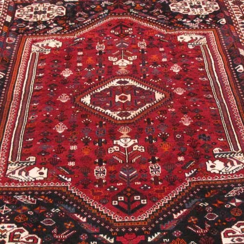 فرش دستباف شيراز طرح لچک و ترنج سایز قالي رنگ زمینه لاكي رنگ حاشیه كرم - هنرظریف